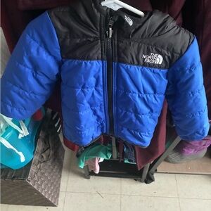 The North Face Blue and Black Child's Puffer Jacket